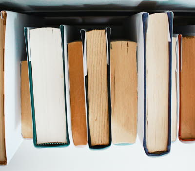 Pile of books. Photo: Joyce McCown, cropped image.