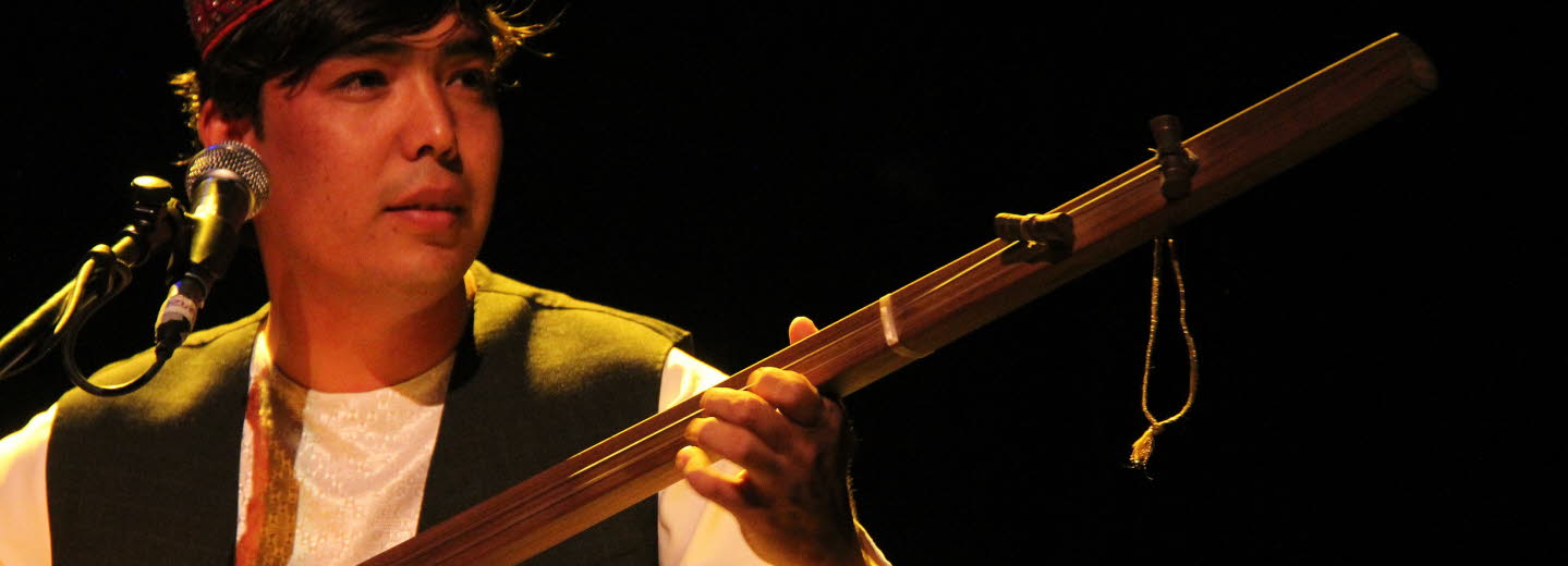 A man with an instrument.