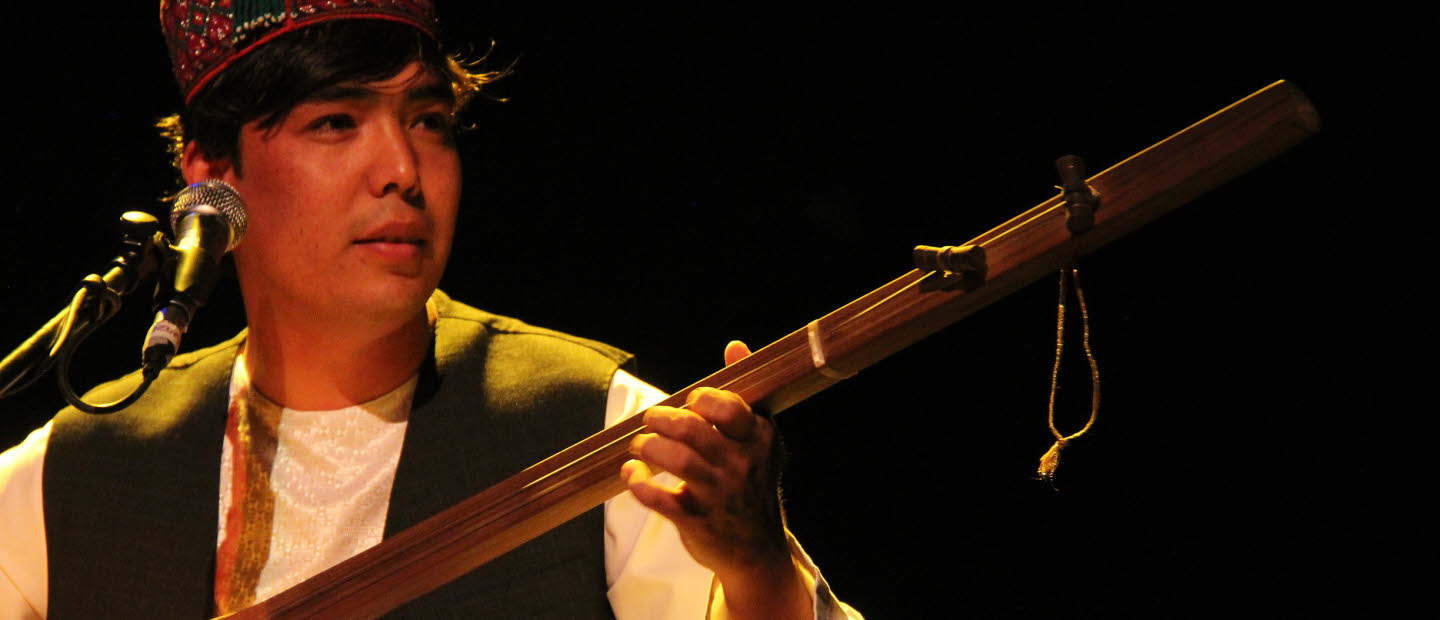 A man with an instrument.