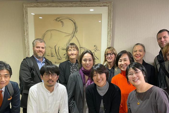 Group photo, 12 people in the picture.