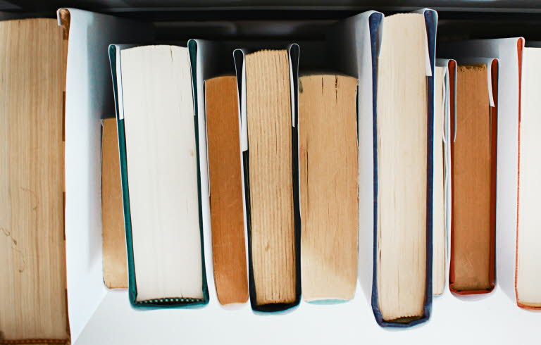 Pile of books. Photo: Joyce McCown, cropped image.