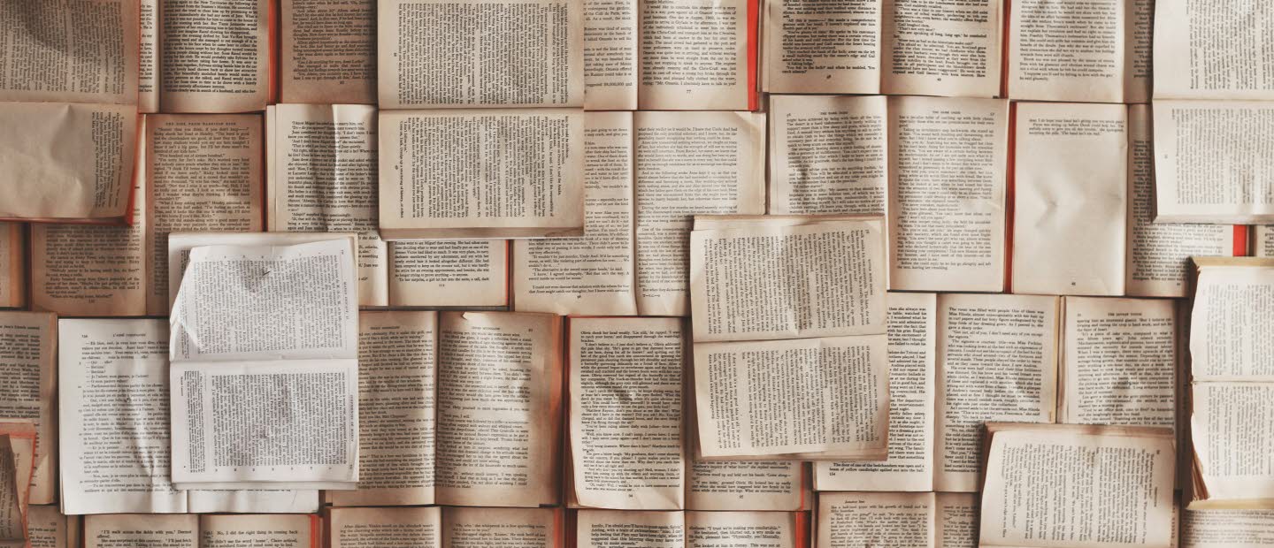 The whole picture is full of open books.