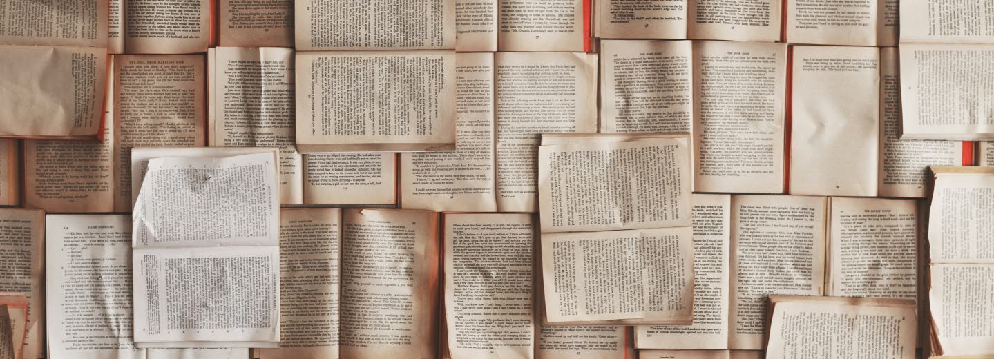 The whole picture is full of open books.