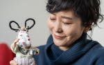 Baek Heena with her figurine "Odd Mama"