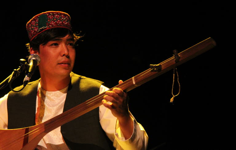 A man with an instrument.