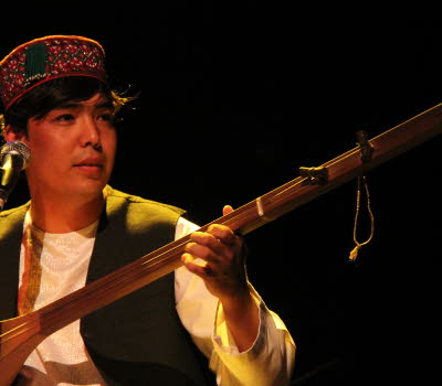 A man with an instrument.